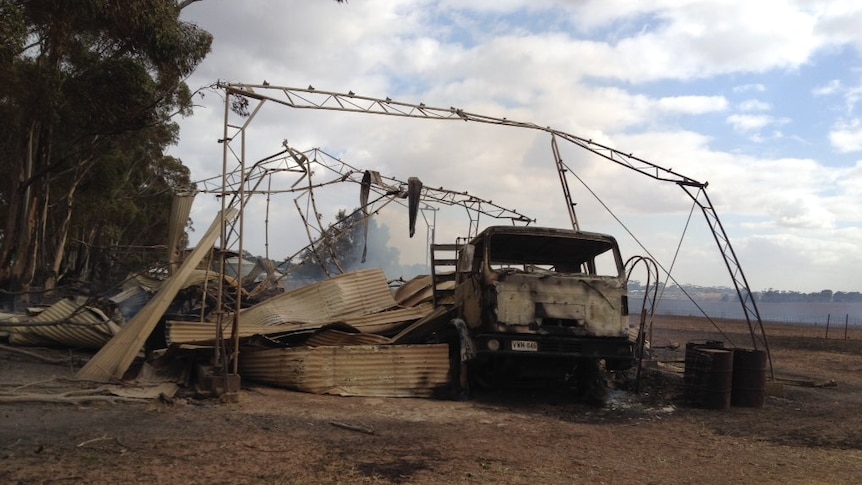 Truck and shed damaged by bushfires