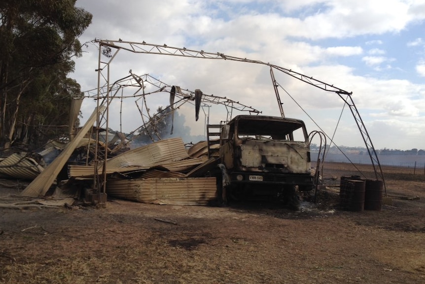 Truck and shed damaged by bushfires