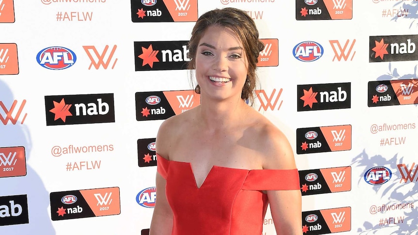 Ellie Blackburn of the Bulldogs poses for photos at the AFLW Women's Best and Fairest awards ceremony.