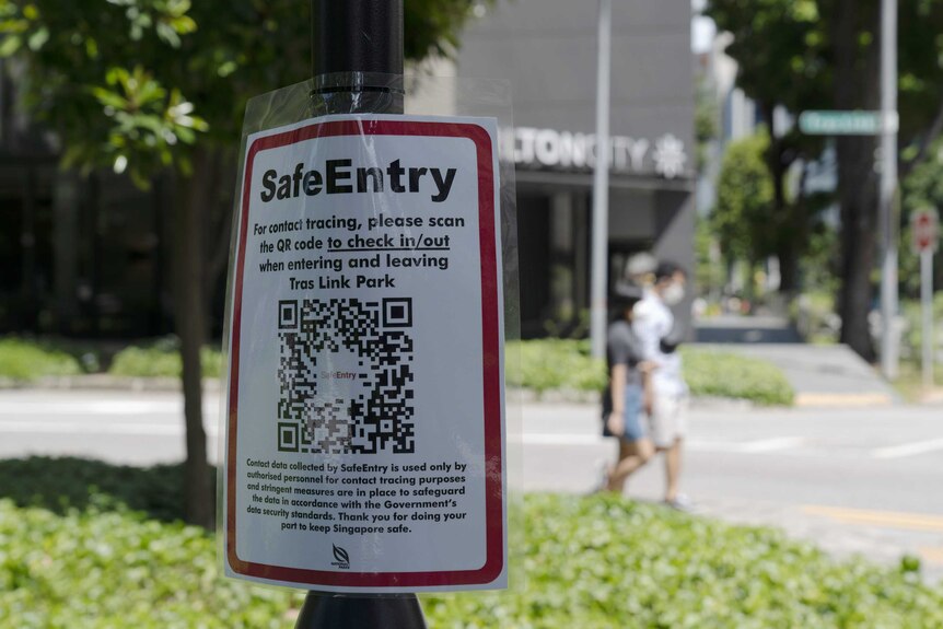 Instructions and QR code for SafeEntry contact tracing at a park in Singapore