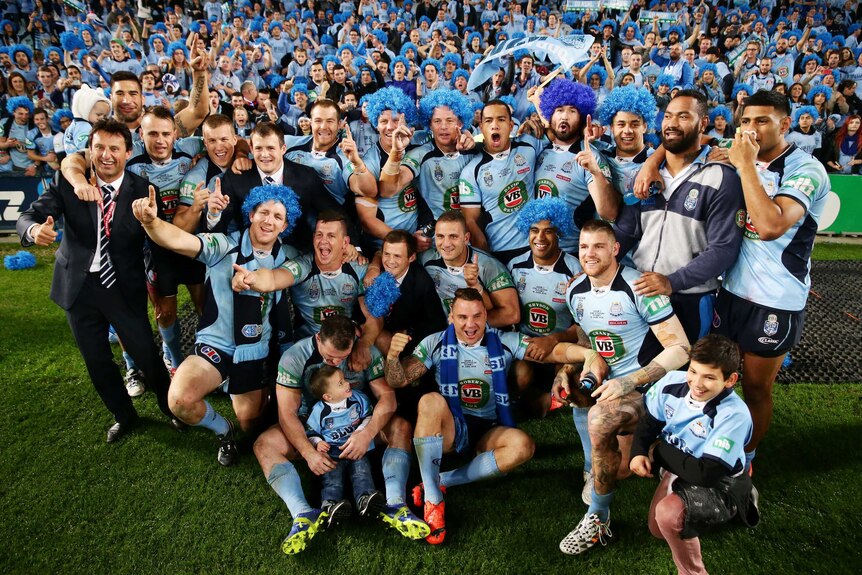 Blues pose for photographers after winning Origin II