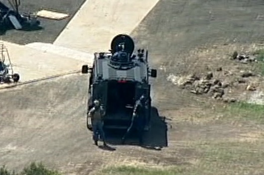 An armoured police vehicle at  property in Lara following a police ramming incident.