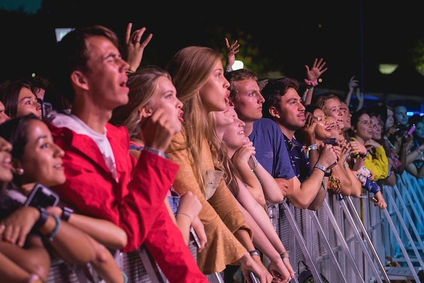 People attending a live concert.