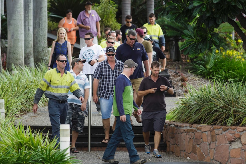 Queensland Nickel creditors and observers leaving a meeting in Townsville January 29.