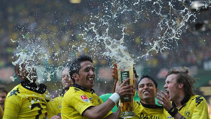 Champions at last ... Lucas Barrios and company secured Dortmund's first Bundesliga win since 2002.