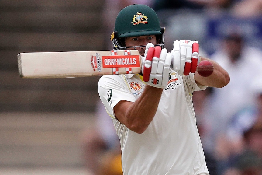 Joe Burns watches closely as he hooks the ball against Sri Lanka in Canberra