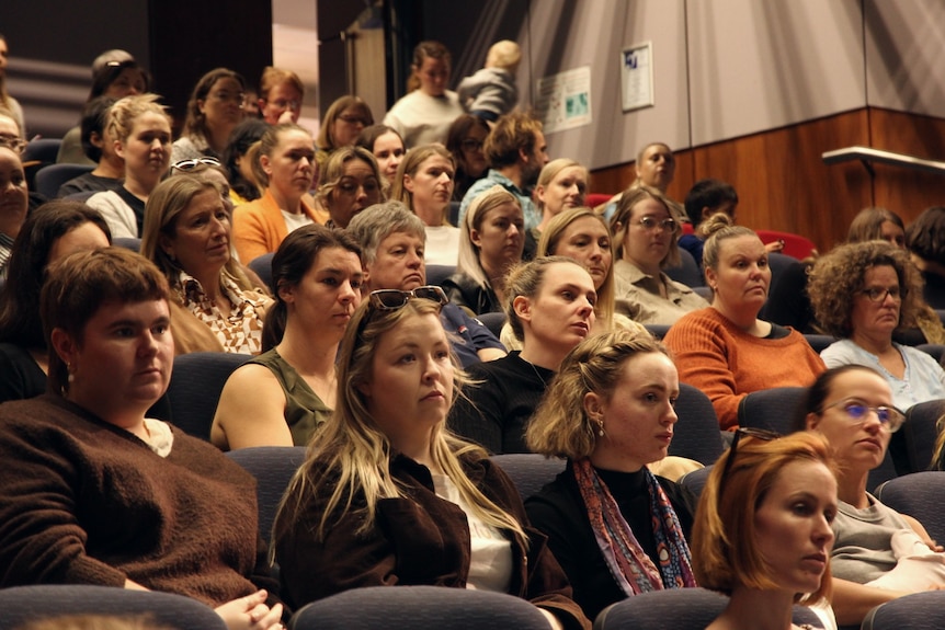  women in a lecture theatre
