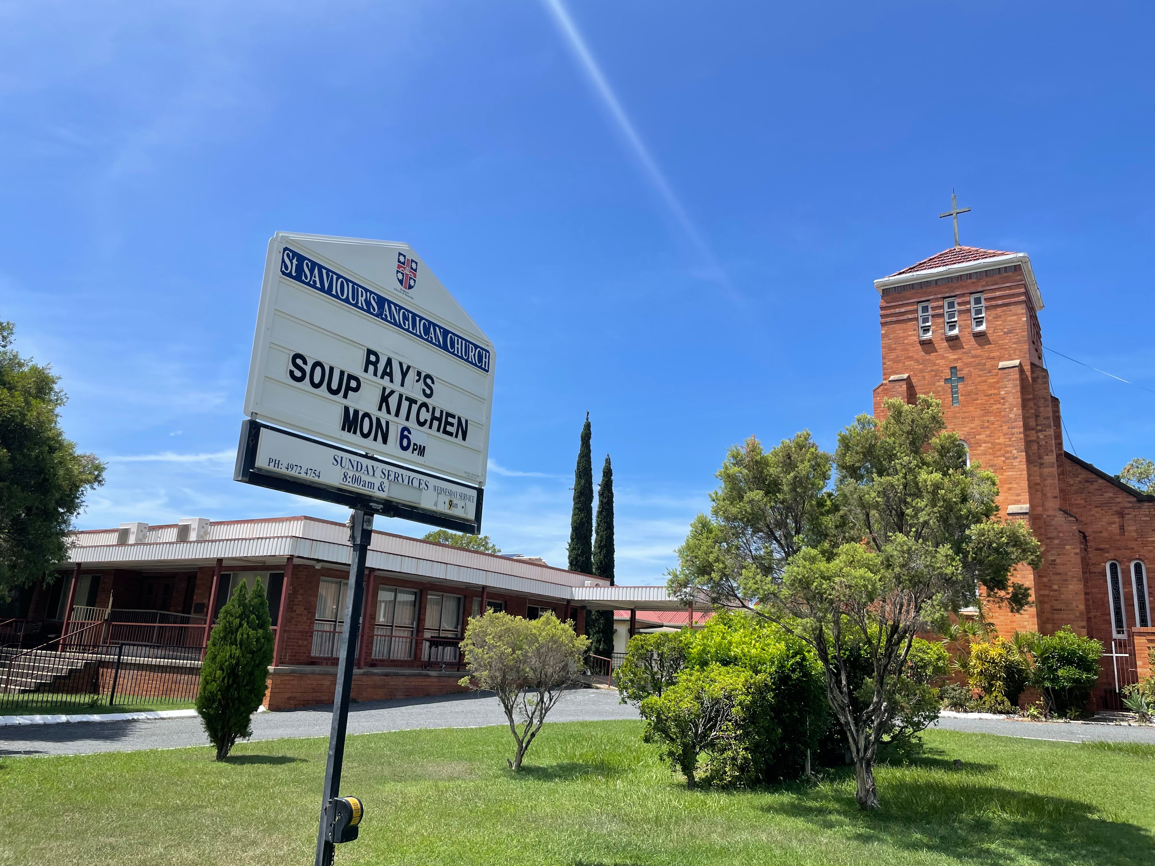 Large sign at church invites people to Ray's Soup Kitchen.
