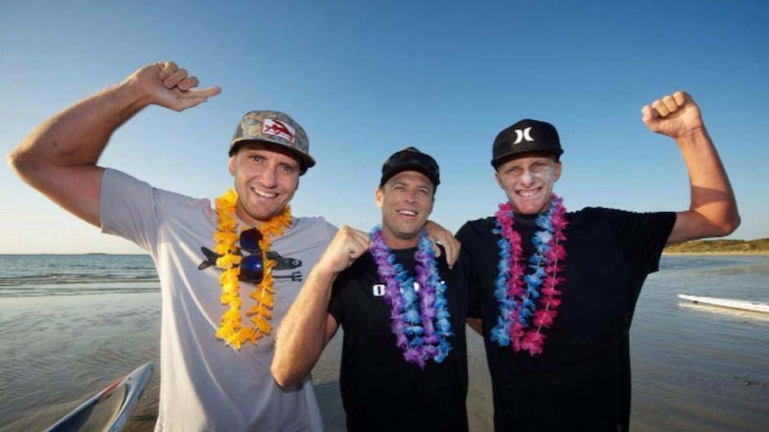 Paddle boarders  Brad Gaul Jack Bark and Zeb Walsh finish a 320 kilometre paddle across Bass Strait.