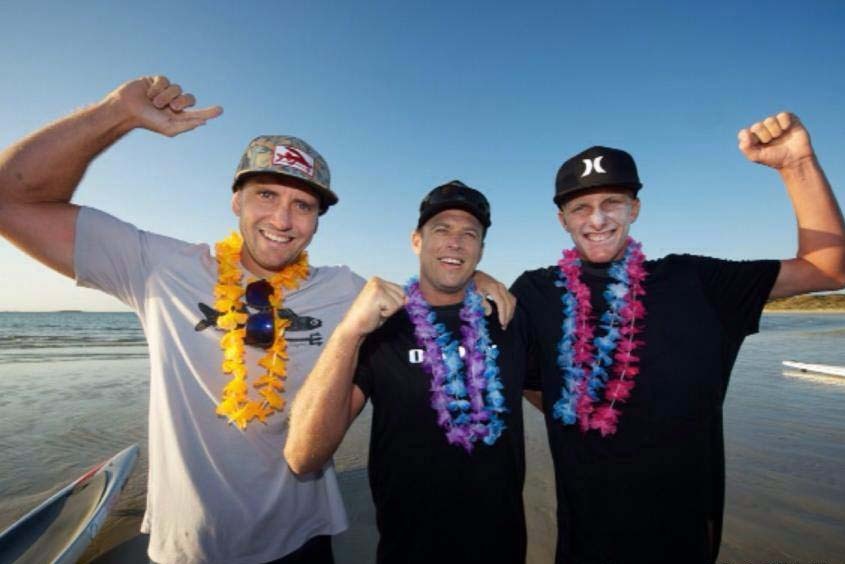 Paddle boarders  Brad Gaul Jack Bark and Zeb Walsh finish a 320 kilometre paddle across Bass Strait.