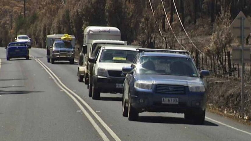 Residents return to homes ravaged by bushfires in Tasmania
