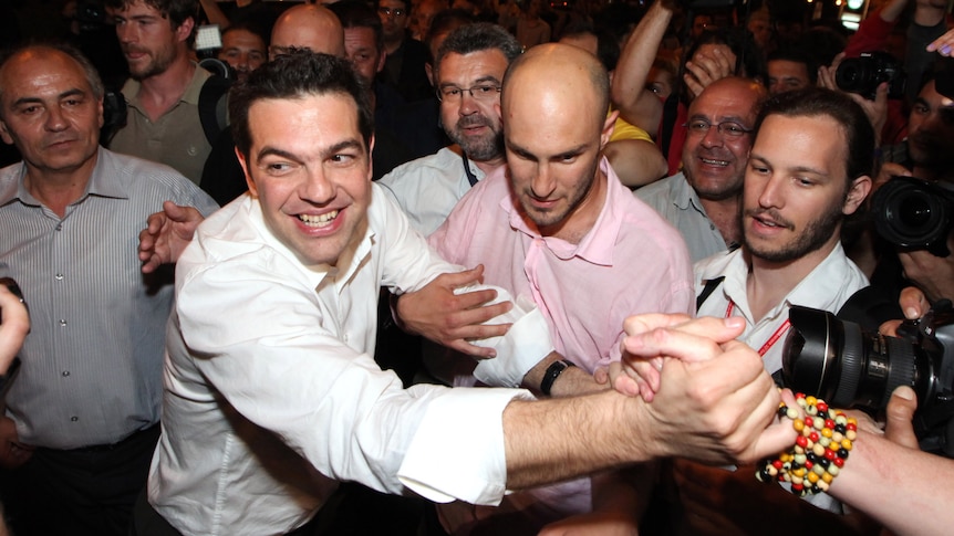 Alexis Tsipras celebrates with supporters in Athens