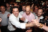 Alexis Tsipras celebrates with supporters in Athens