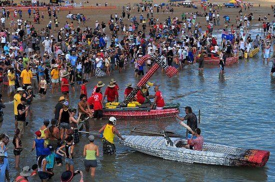 A crowd watches preparations for the 2012 Beer Can Regatta.