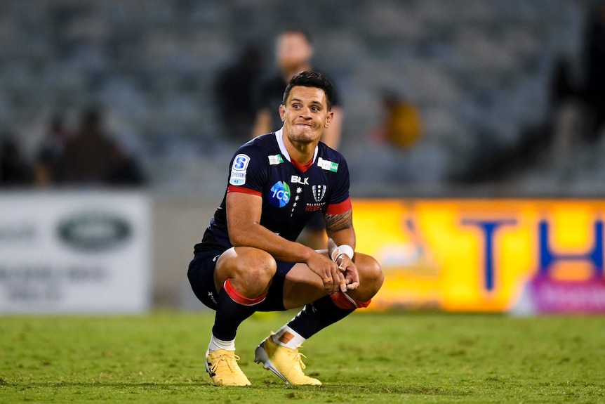 Matt Toomua crouches on Canberra Stadium.