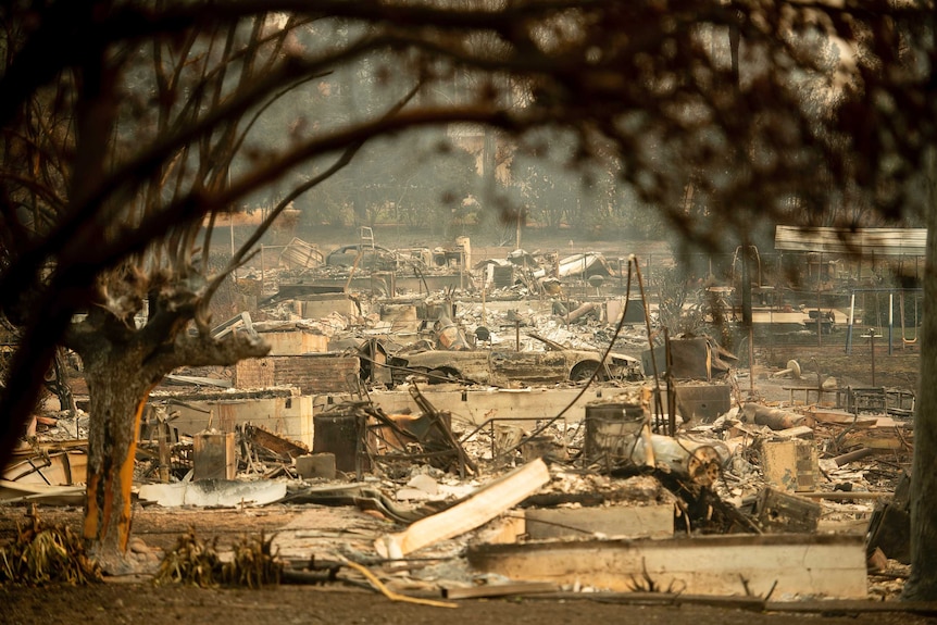 Homes leveled by the Camp Fire line a development on Edgewood Lane in Paradise, Calif., Monday, Nov. 12, 2018.