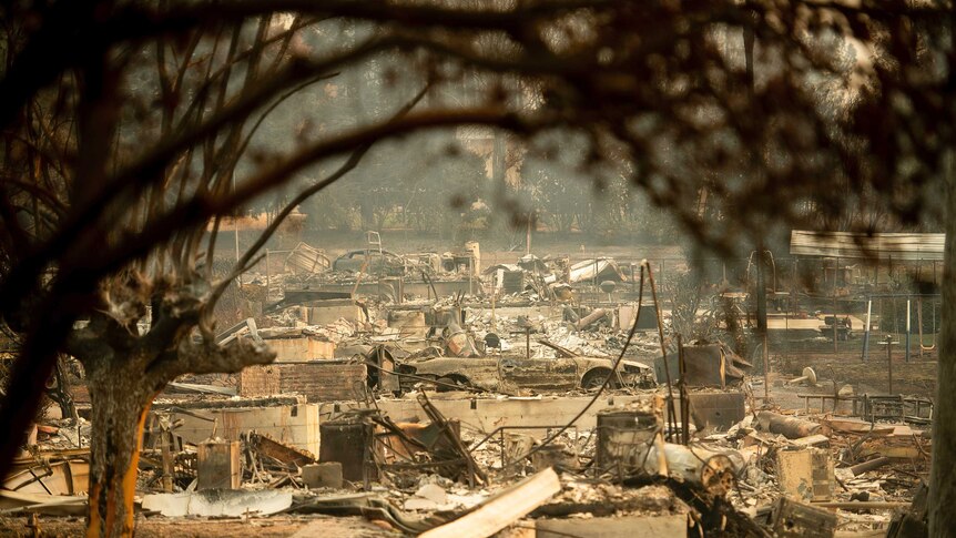 Homes leveled by the Camp Fire line a development on Edgewood Lane in Paradise, Calif., Monday, Nov. 12, 2018.