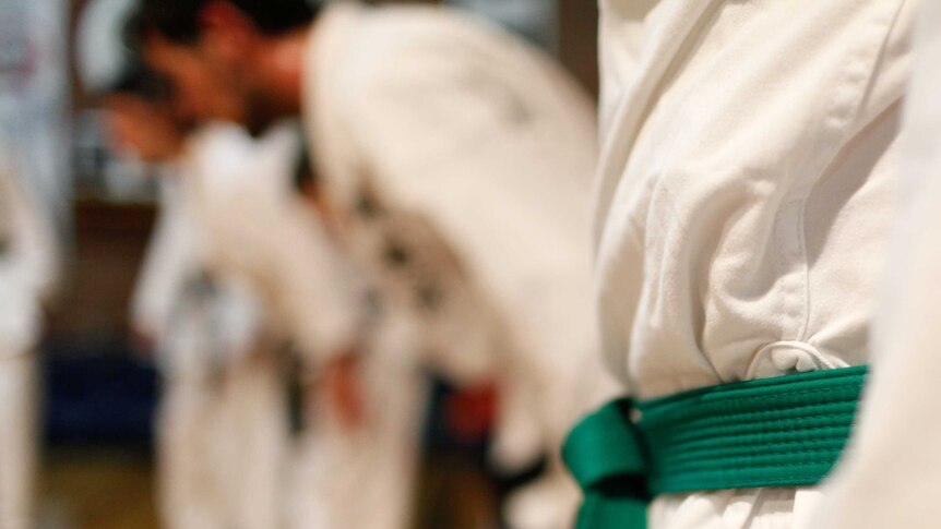 Green belt karate student in Sandford, Tasmania