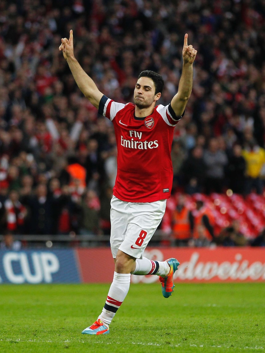 Mikel Arteta celebrates a goal for Arsenal