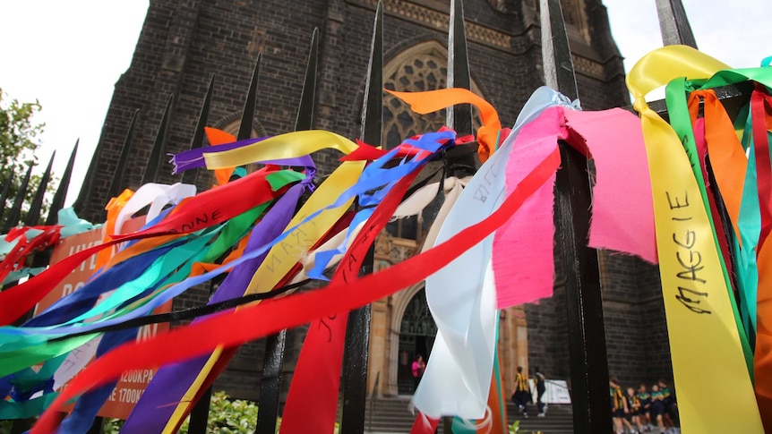 Colourful ribbons on the fence outside St Patrick's Cathedral in Melbourne.