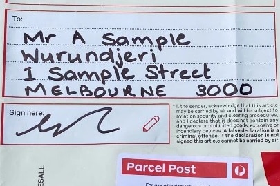 A sample Australia Post bag showing where the Aboriginal place name will go on the label.