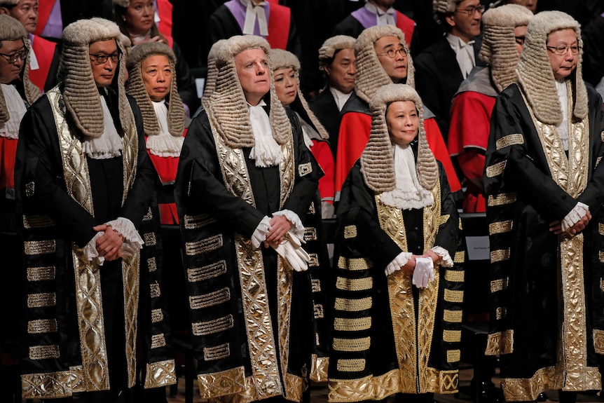 Hong Kong judges don wigs and robes during the opening of the legal year at City Hall 