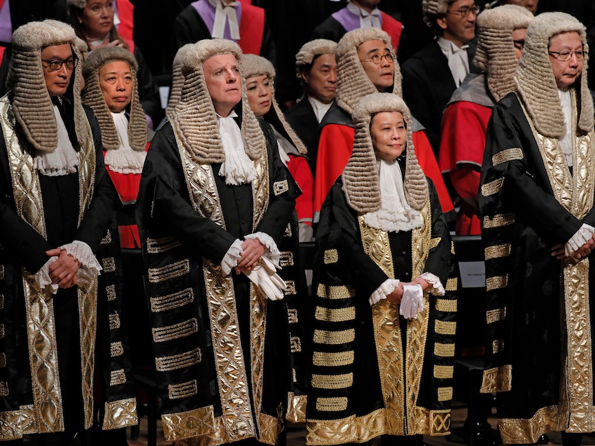 Hong Kong judges don wigs and robes during the opening of the legal year at City Hall 