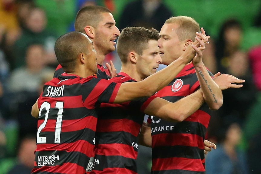 Wanderers celebrate Shannon Cole's goal against Melbourne Heart