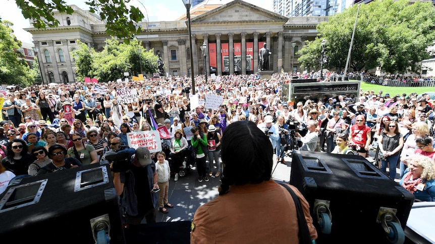 Protesters attend an Donald Trump Inauguration protest outside the State Library in Melbourne.
