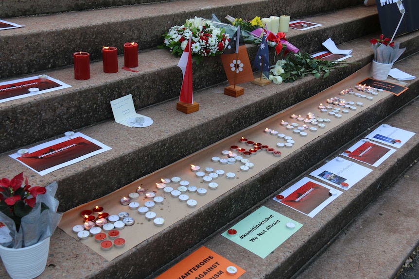 Memorial tributes at Darwin's Civic Park steps for the Jakarta terror attacks.