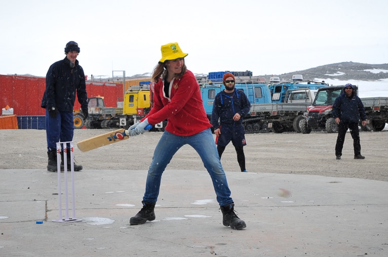 Dr Hawker playing cricket on Australia Day at Casey Station.