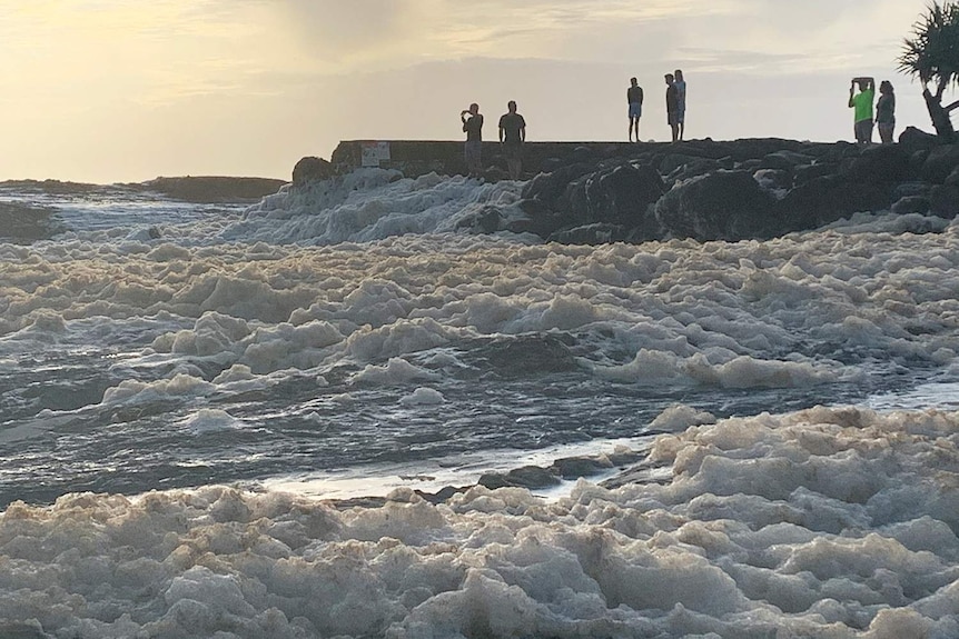 Frothy surf at Snapper Rocks after wild weather.