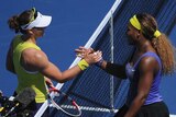 Samantha Stosur shakes hands with Serena Williams in Cincinnati