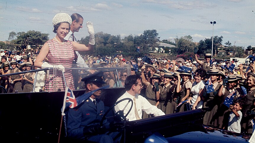 Queen Elizabeth II and the Duke of Edinburgh greeting children in 1970.