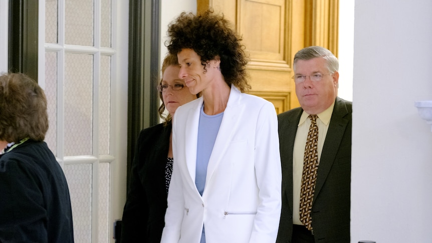 Andrea Constand walks out of the courtroom.