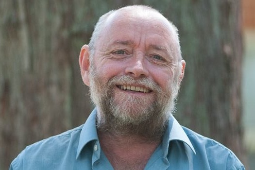 Closeup of a man with a beard.