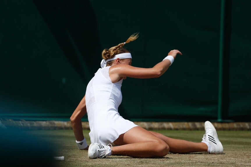 Kristina Mladenovic slips during Wimbledon match