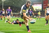 Michael Morgan scores a try against the Melbourne Storm in their preliminary final