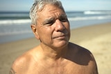 Warren Mundine shirtless at the beach