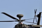 A British official says four Apache helicopters will operate from HMS Ocean, off Libya's coast.