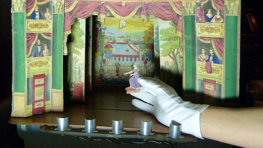 Positioning a character in the toy theatre