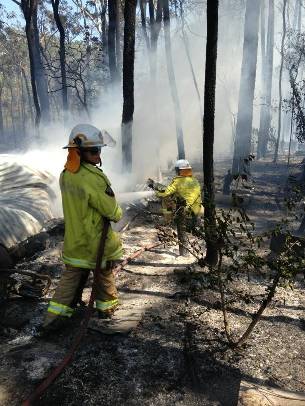 Firefighters on the Sunshine Coast battle a blaze that has destroyed a number of caravans in the hinterland suburb of Doonan.