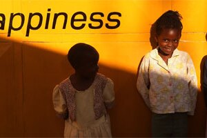 Kenyan children wait for aid