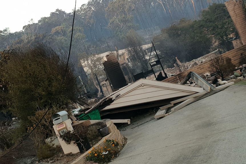 Burnt house with collapsed roof