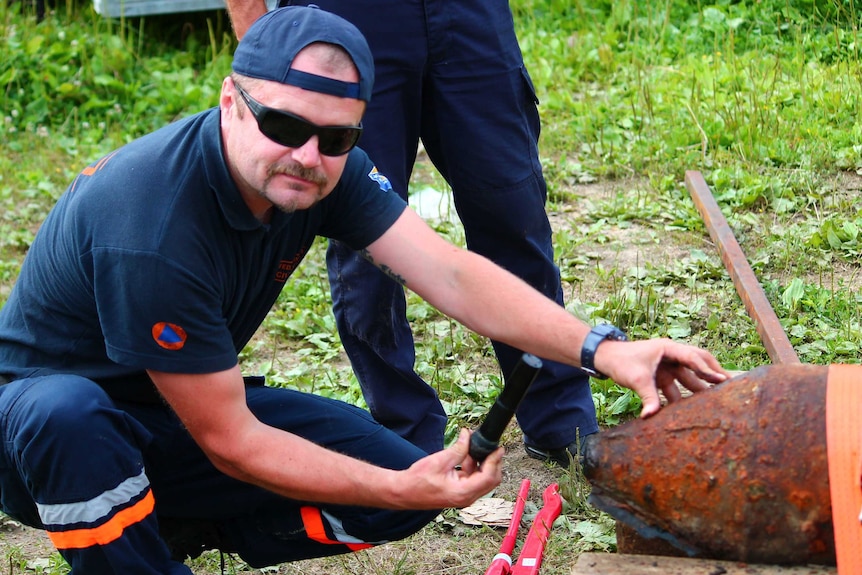 Sead Vrana outside with a disabled explosive device