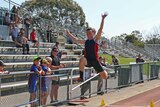 Tasmanian athlete Jack Hale competes in long jump