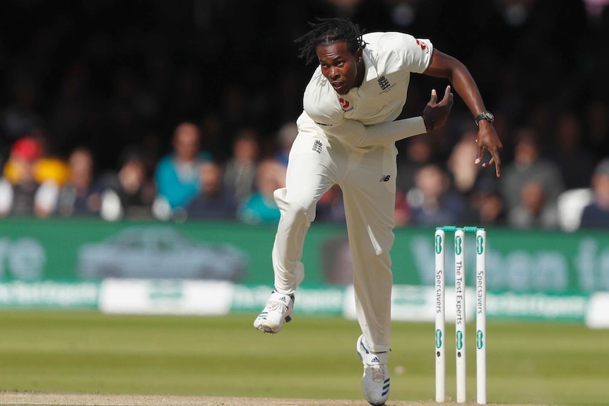 Jofra Archer bends his back as he bowls at Lord's Cricket Ground