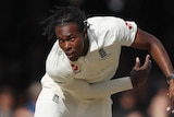 Jofra Archer bends his back as he bowls at Lord's Cricket Ground