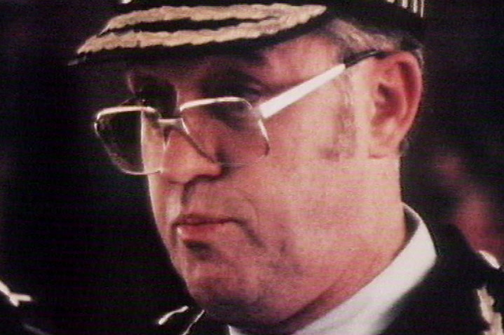 Tight headshot of Queensland police commissioner Terry Lewis speaking to the media in Brisbane in the 1980s.