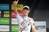 Australian cyclist Ben O'Connor of AG2R Citröen Team gives a thumbs up on the the podium after the Criterium du Dauphine 2022.